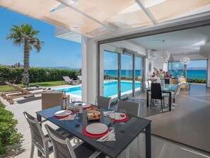 Villa, 3 Bedrooms, Beachfront | Living area | Plasma TV - Villa Almyra (Hersonissos)