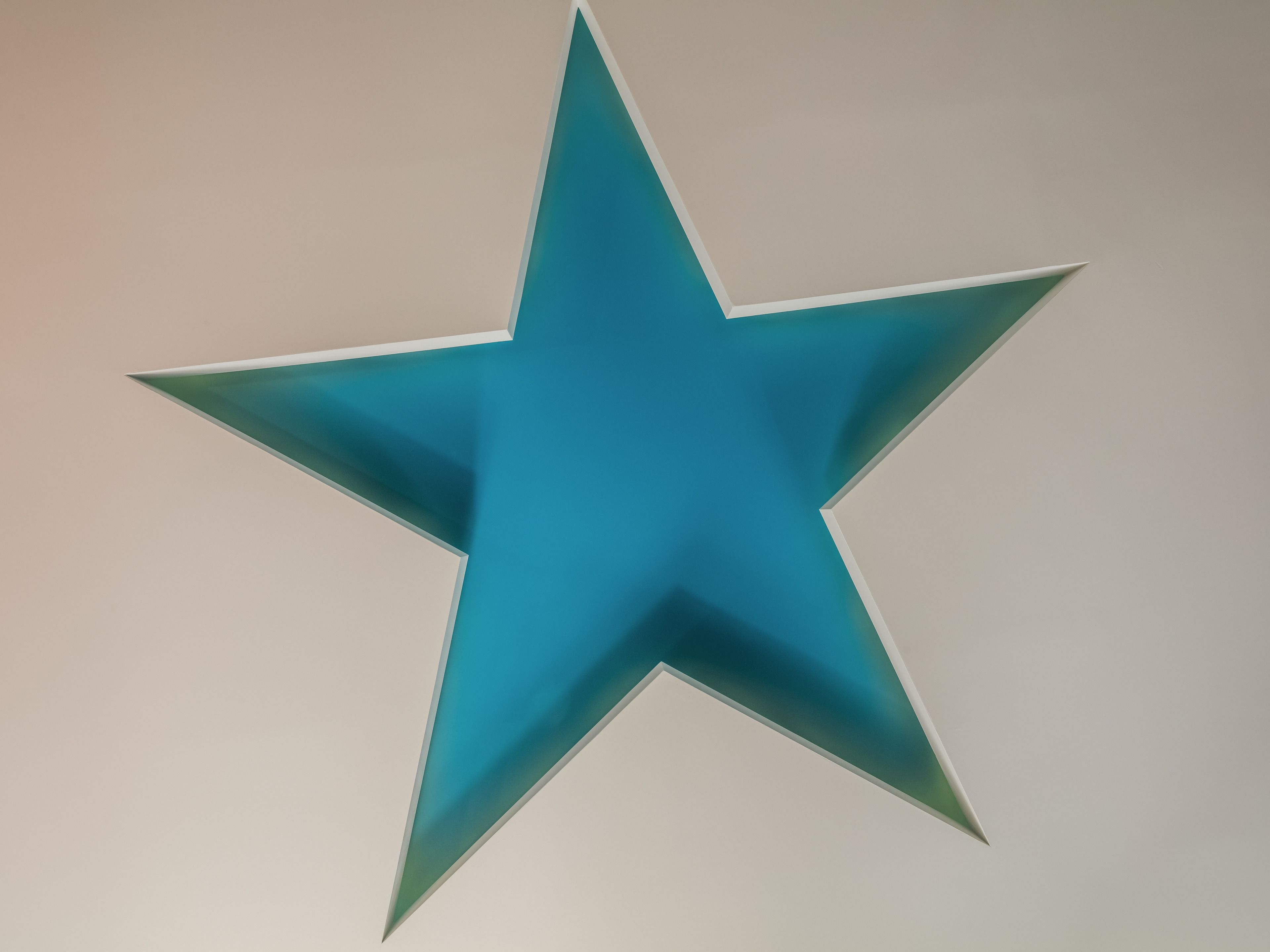 A large blue star-shaped decoration.