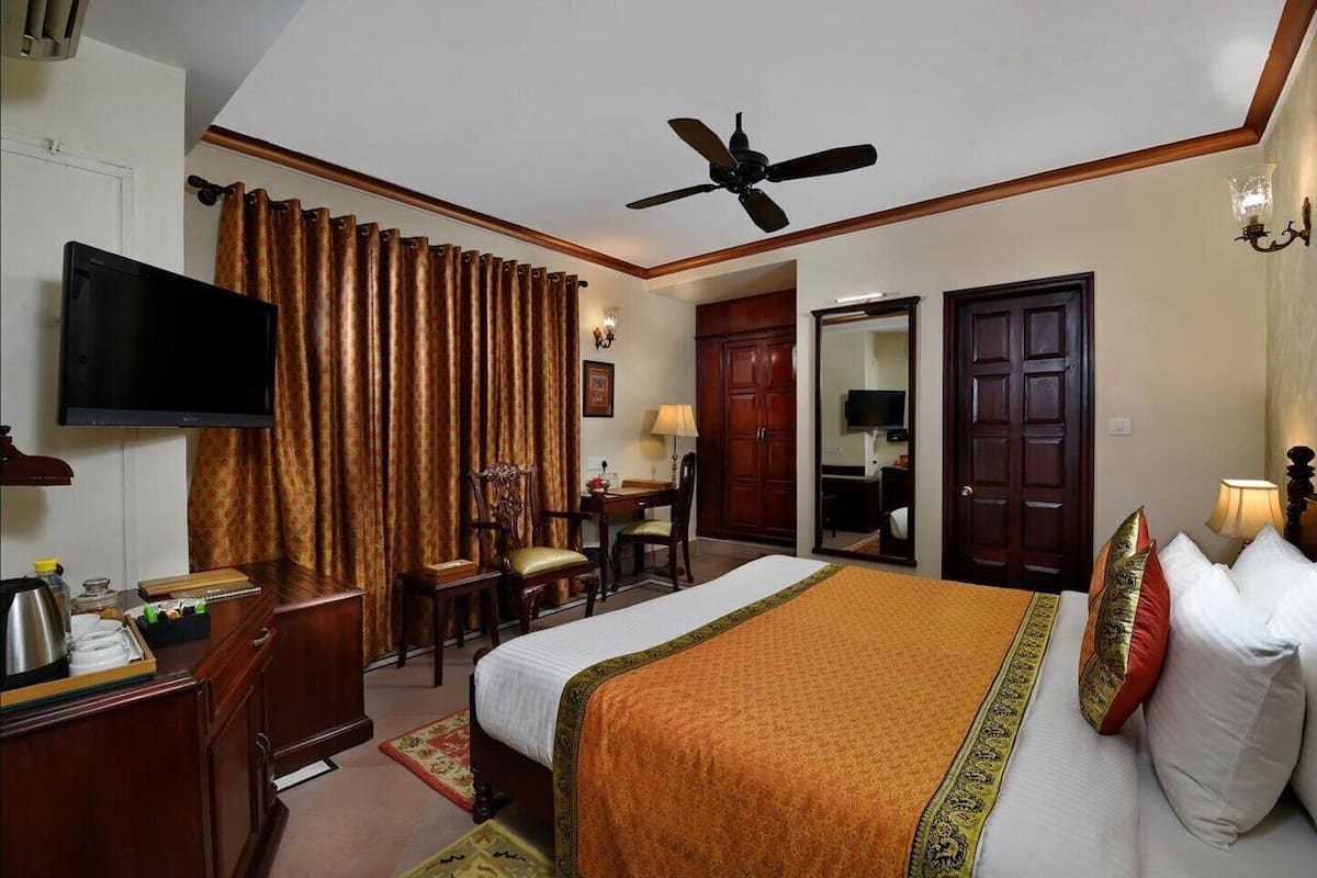 Dhanurdhara Room | 1 quarto, roupas de cama premium, frigobar, cofres nos quartos