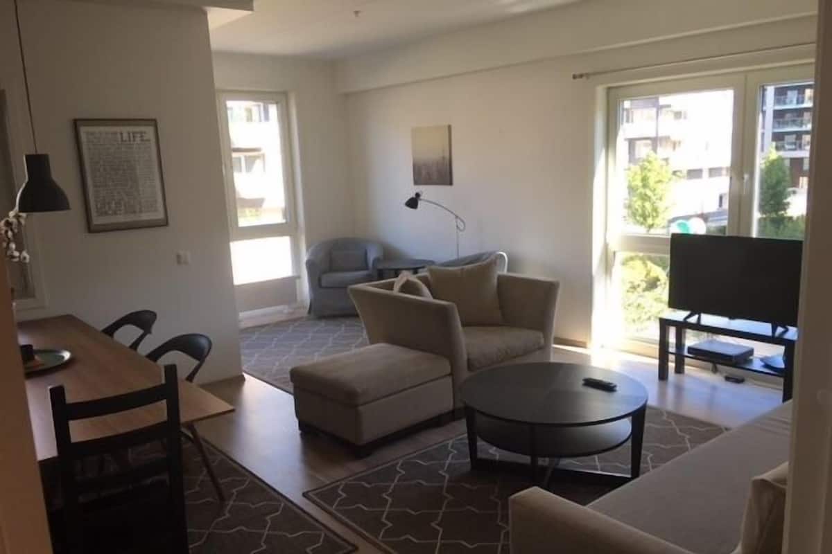Apartment 2 Bedrooms Sorengkaia 100 (Towels/Sheets/Cleaning Excluded) | Living room | TV