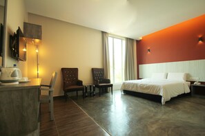 Executive Deluxe Room | Desk, iron/ironing board, free WiFi
