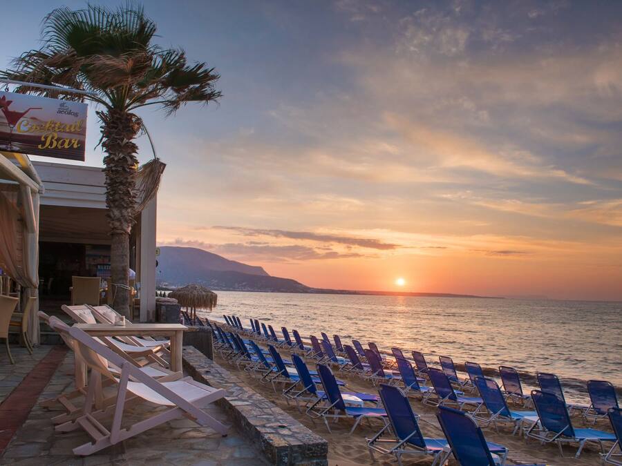 On the beach, sun loungers, beach umbrellas