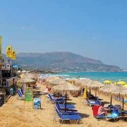 On the beach, sun-loungers, beach umbrellas