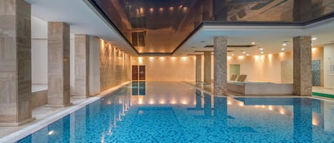 Indoor pool, seasonal outdoor pool, pool umbrellas, sun loungers