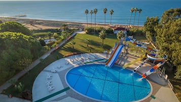 Indoor pool, seasonal outdoor pool, pool umbrellas, pool loungers