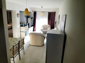 Family Apartment, 2 Bedrooms, Non Smoking, Partial Sea View | Living room | Flat-screen TV - Faneromeni Court (Paphos)