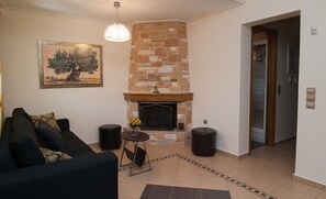 Apartment, 1 Bedroom | Living area | Flat-screen TV, fireplace - Villa Dioni (Rafina-Pikermi)