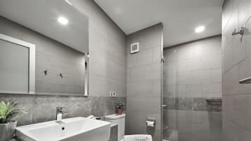 Shower, free toiletries, hair dryer, slippers