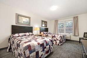 Desk, free cots/infant beds, free WiFi, bed sheets - Guest House Inn & Suites (Edson)