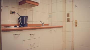 Apartment | Private kitchen | Full-size fridge, stovetop, cookware/dishes/utensils