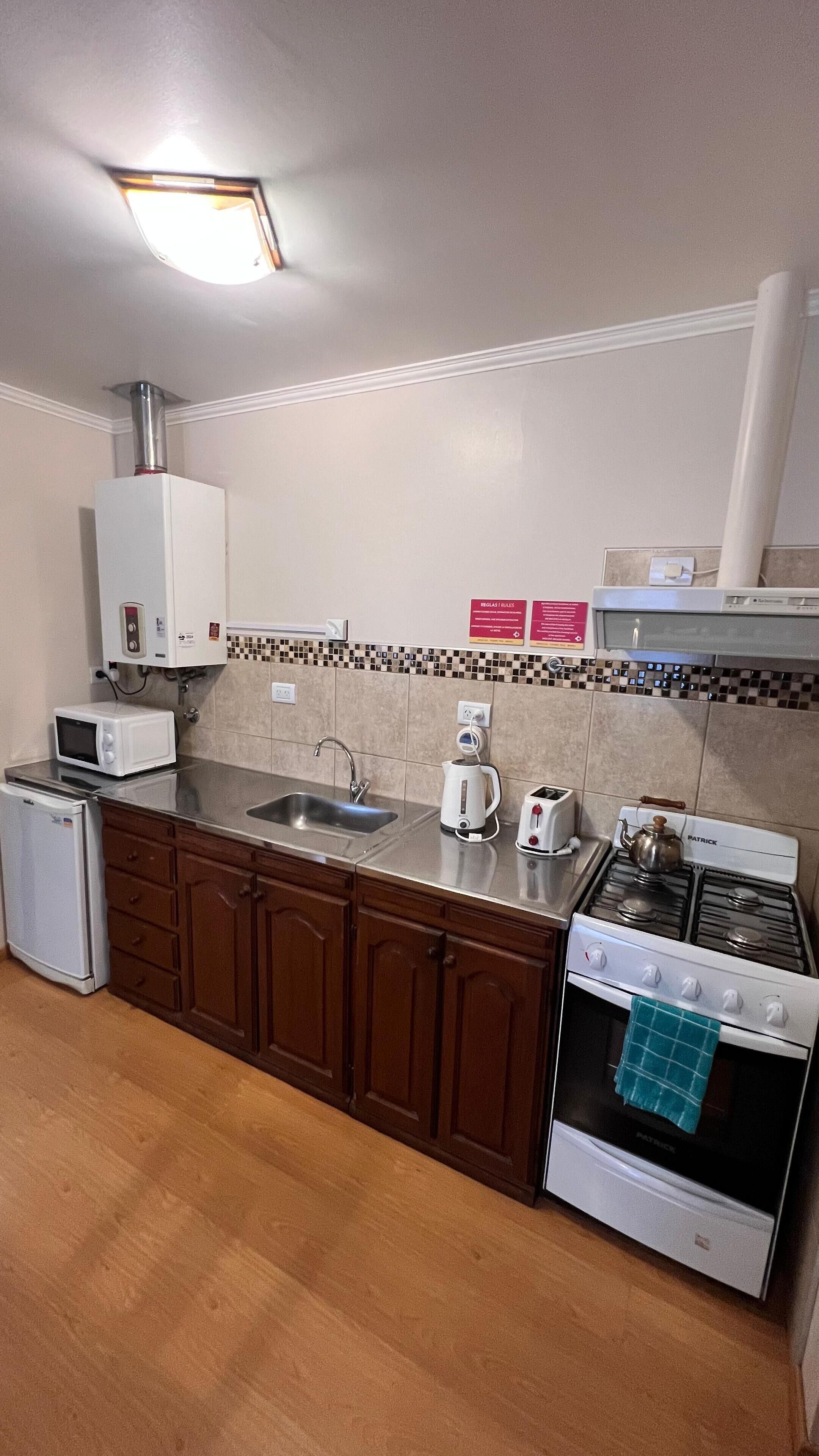 department a | private kitchen | mini-fridge, stovetop, cookware/dishes/utensils