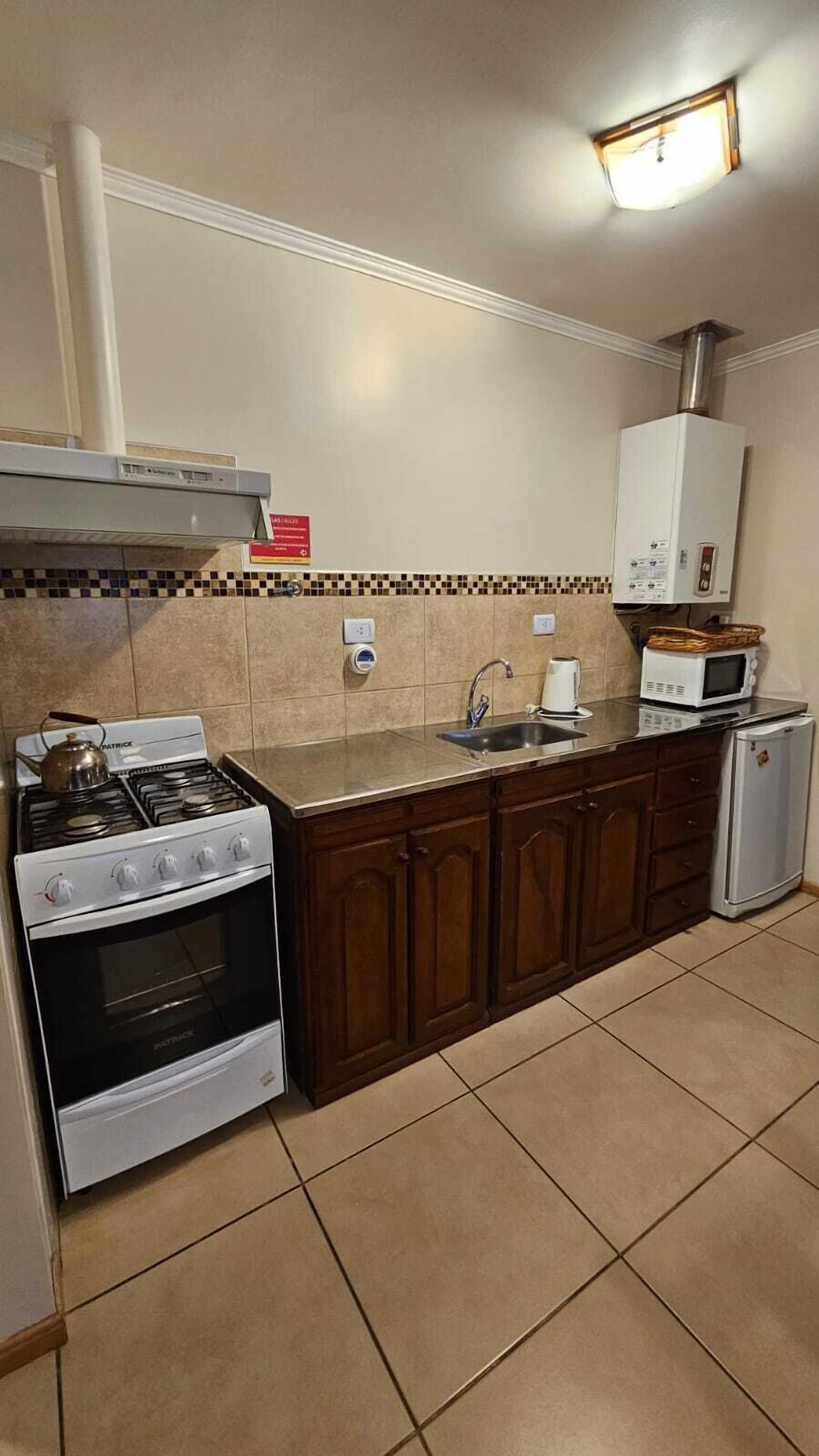 department b | private kitchen | mini-fridge, stovetop, cookware/dishes/utensils