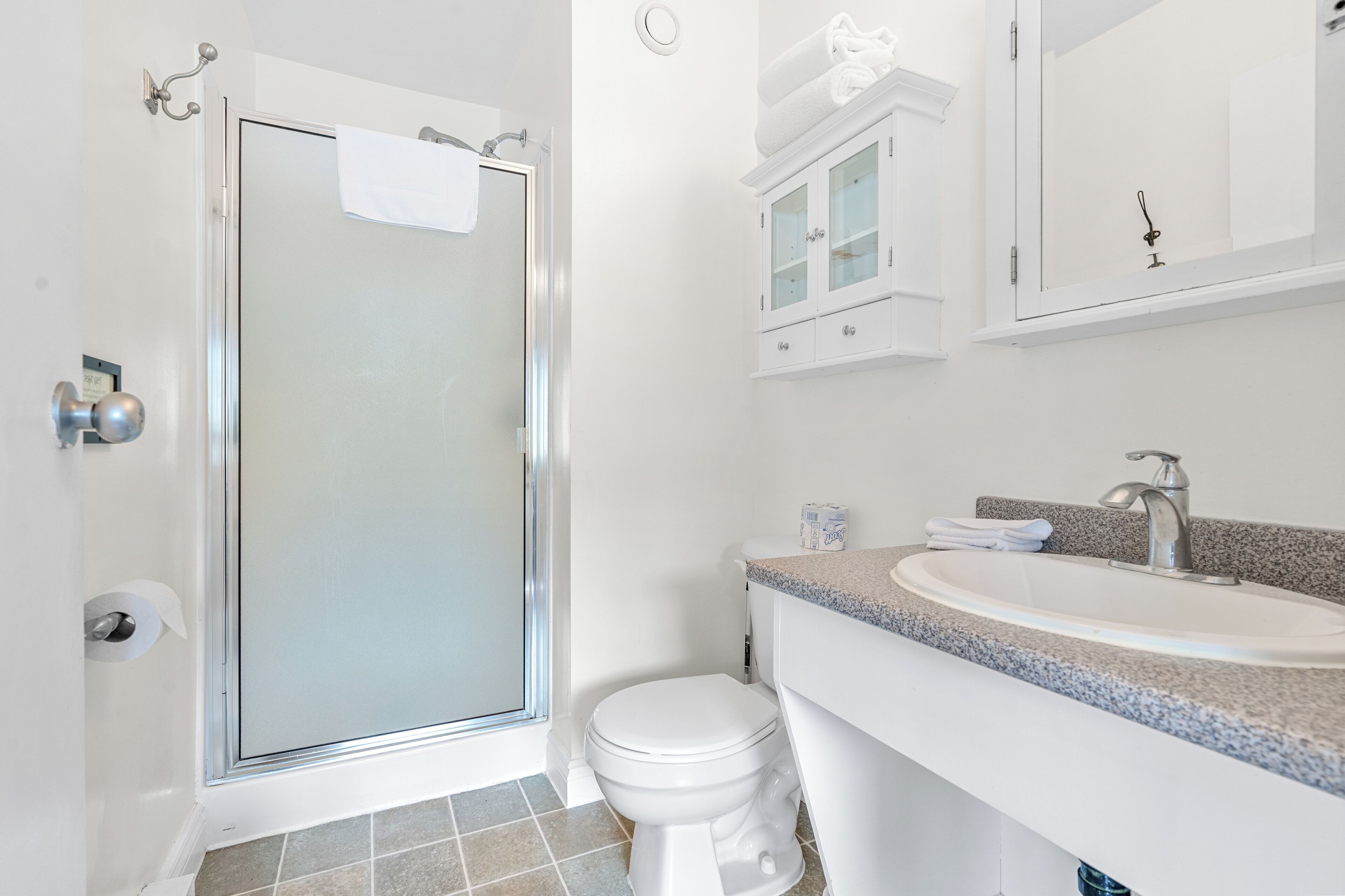 kitchenette suite | bathroom | eco-friendly toiletries, hair dryer, towels