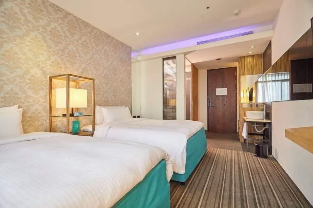 Premium bedding, down duvets, in-room safe, desk