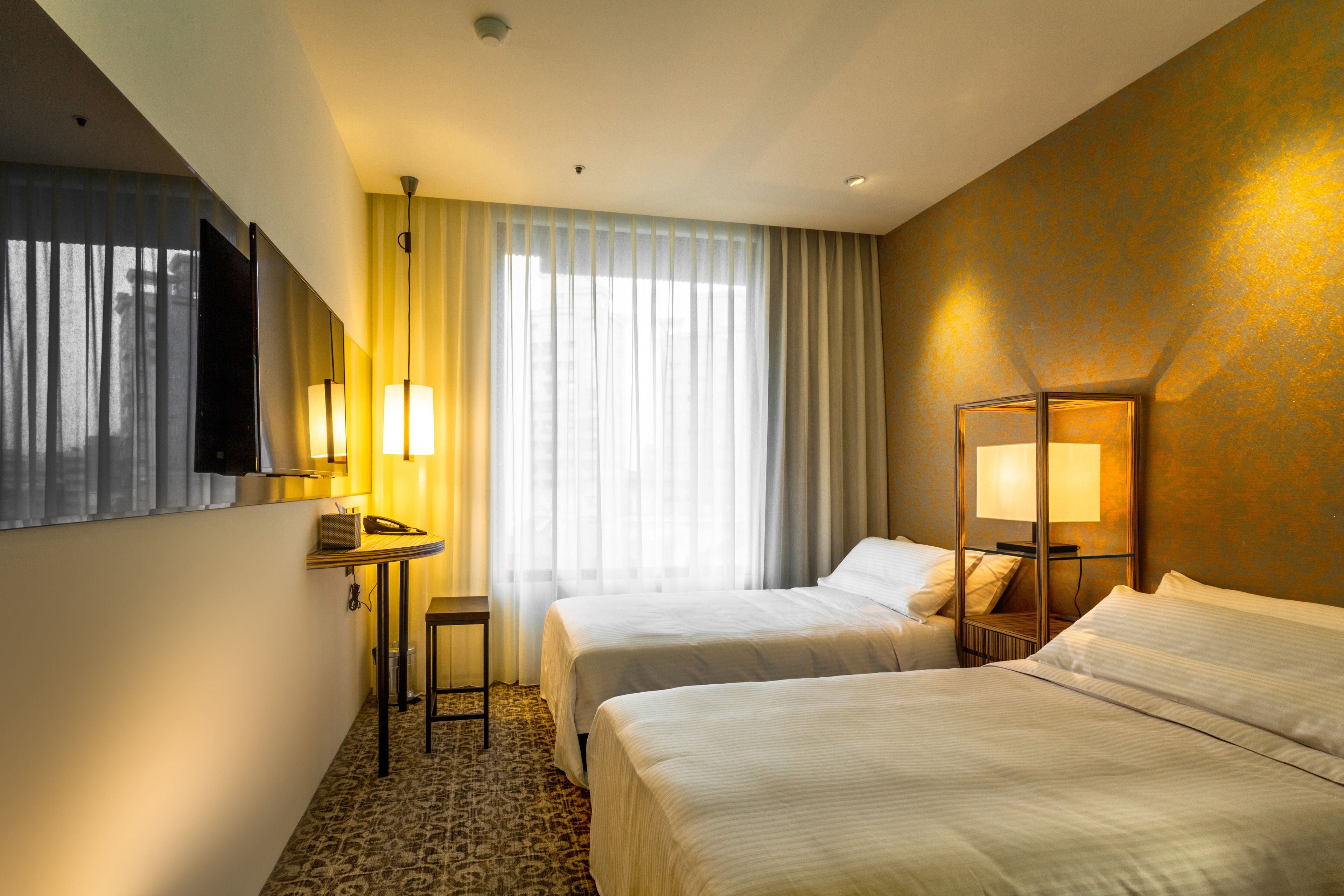 premium bedding, down duvets, in-room safe, desk