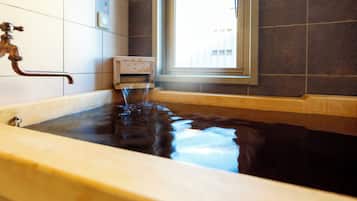 Shower, free toiletries, hair dryer, slippers