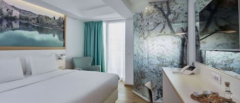 Luxe beddengoed, een minibar, een kluis op de kamer, een bureau