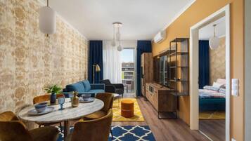 尊爵頂樓客房, 1 間臥室 | 起居區 | 電視