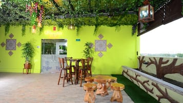 Breakfast, lunch, dinner served; local cuisine