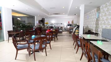 Breakfast, lunch, dinner served; local cuisine