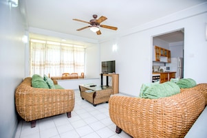 Deluxe Superior Apartment, 2 Bedroom | Living room | Flat-screen TV