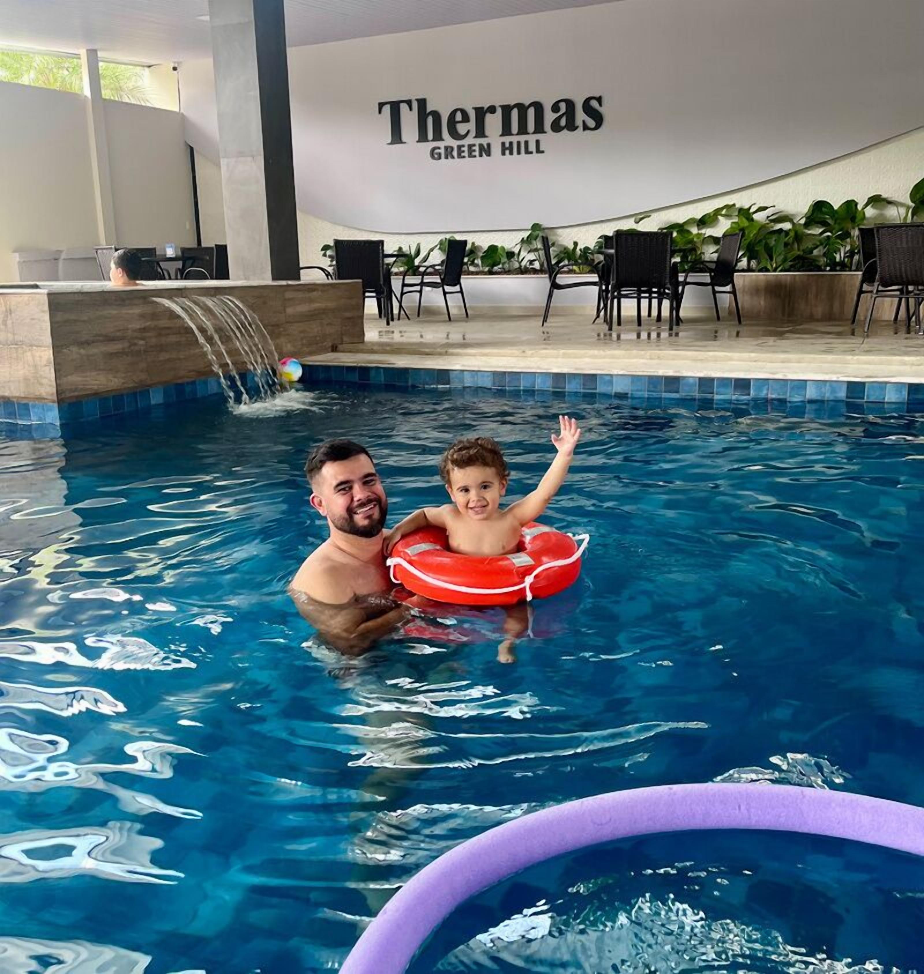 Indoor pool, outdoor pool, pool umbrellas, pool loungers