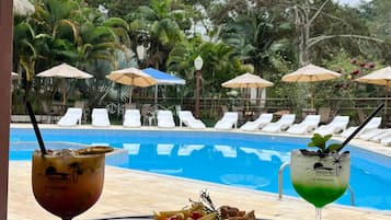 Indoor pool, outdoor pool, pool umbrellas, pool loungers