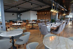 Breakfast, lunch, dinner served; international cuisine 