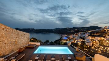 Outdoor pool, pool umbrellas, sun loungers
