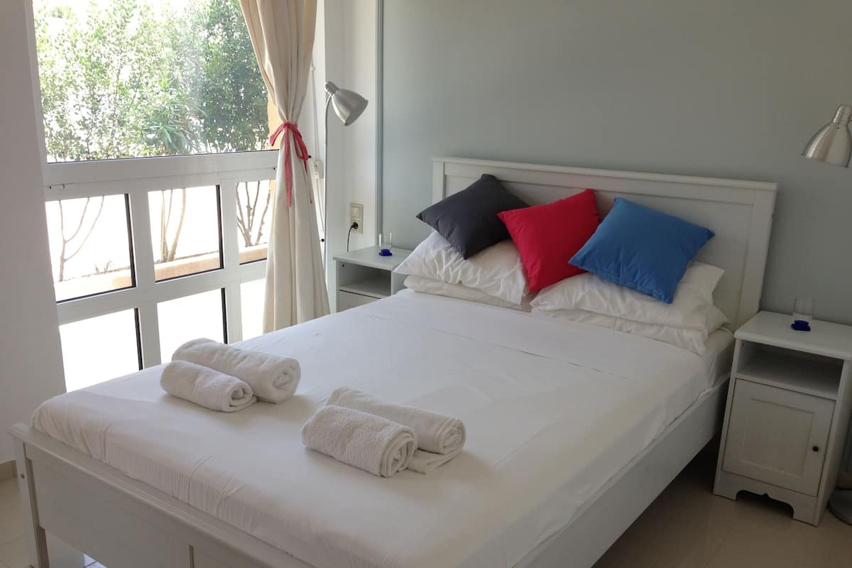 Apartment, Garden View | In-room safe, iron/ironing board, free cribs/infant beds, free WiFi