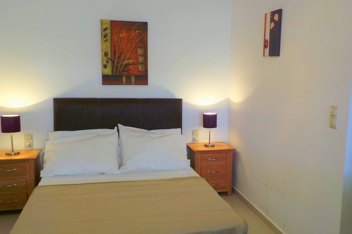 Apartment, 1 Bedroom, Garden View | In-room safe, iron/ironing board, free cribs/infant beds, free WiFi