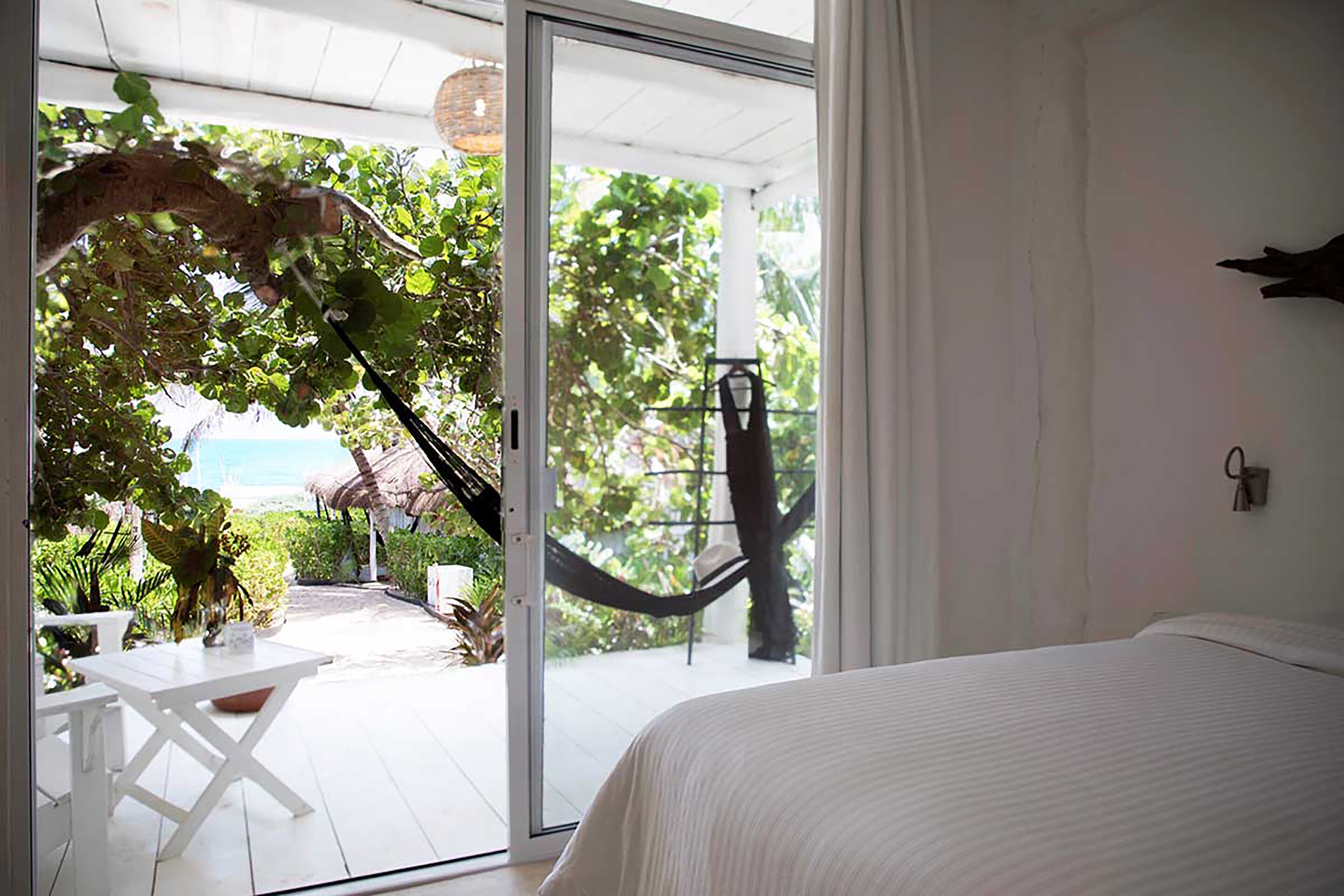 partial ocean view room private bath | in-room safe, bed sheets