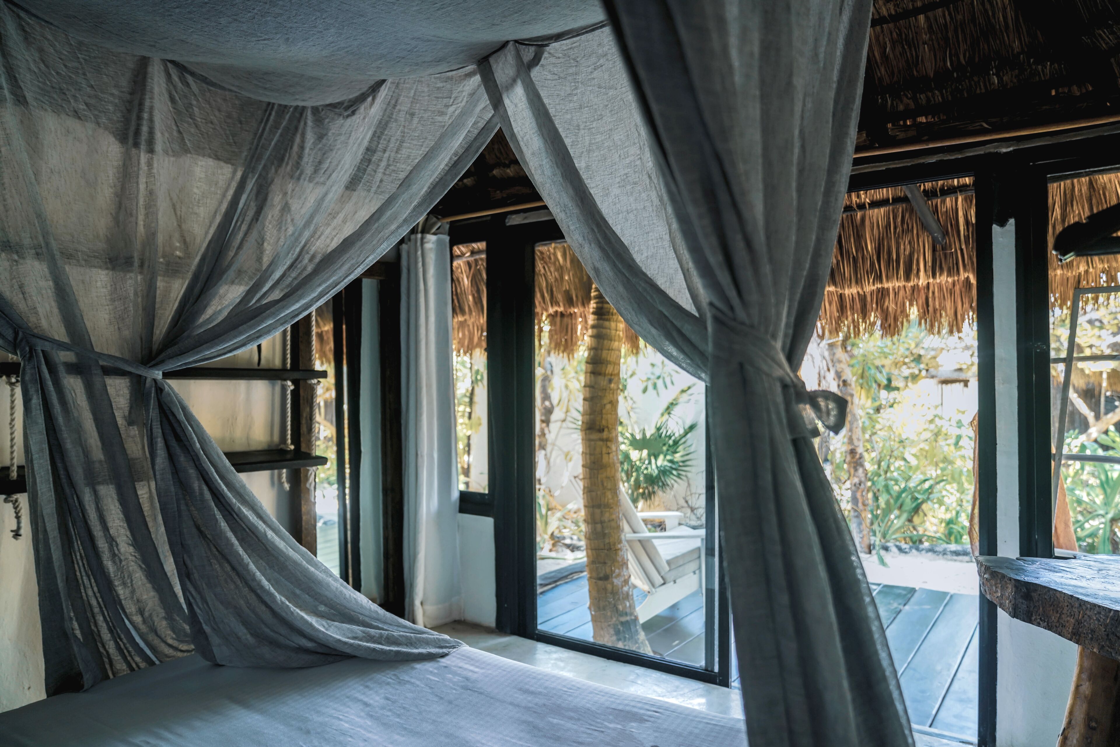 garden view shared bathroom | in-room safe, bed sheets