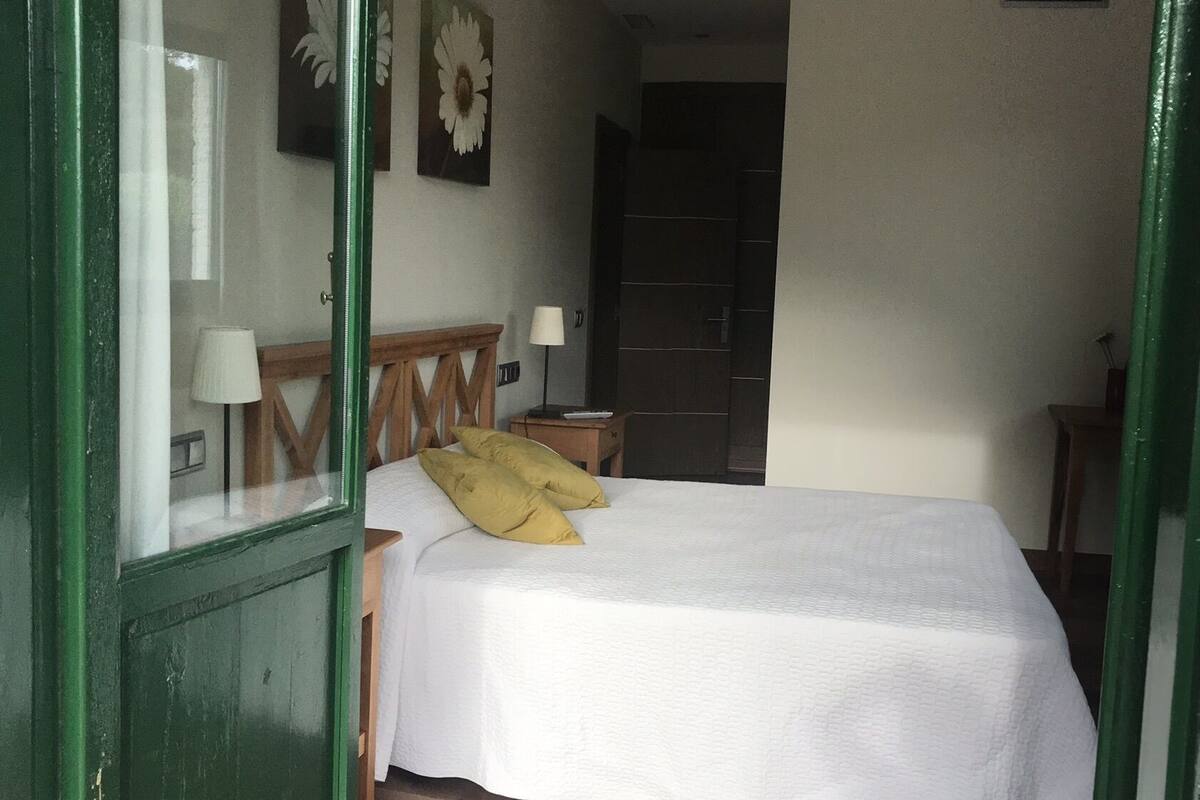 Double Room, Balcony, River View | Minibar, desk, blackout curtains