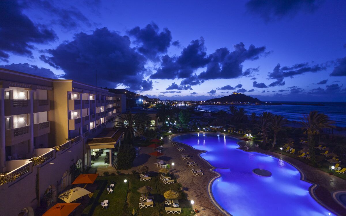 Indoor pool, outdoor pool, pool umbrellas, sun loungers