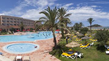 Indoor pool, outdoor pool, pool umbrellas, sun loungers