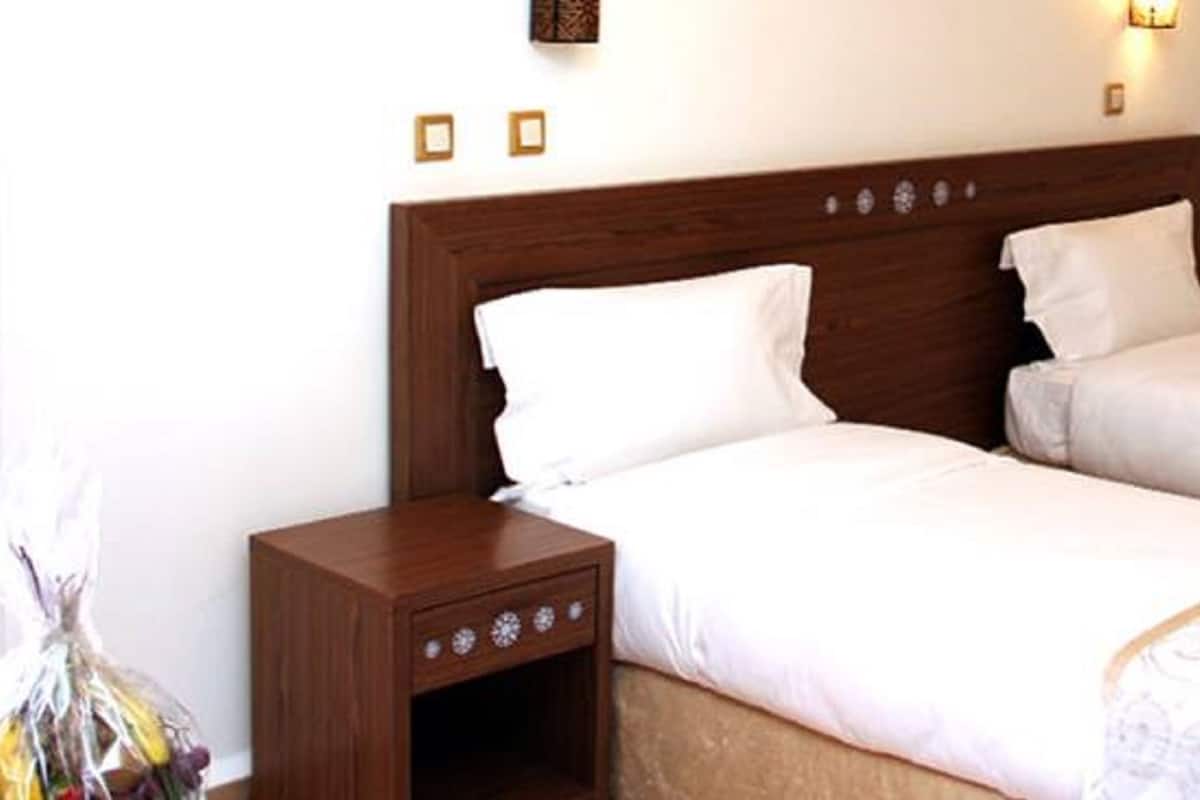 Standard Double Room | Minibar, in-room safe, desk, blackout curtains