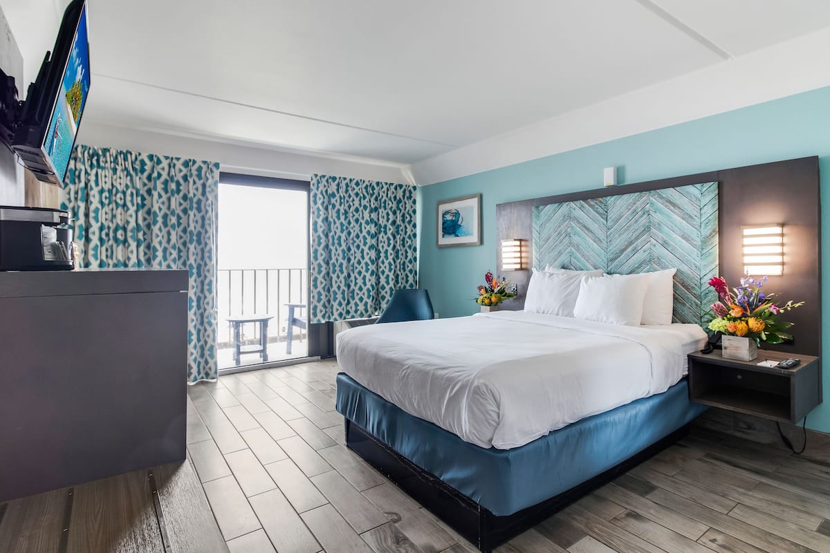 room, 1 king bed, ocean view | in-room safe, laptop workspace, iron/ironing board, free wifi