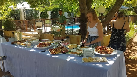 Breakfast, lunch, dinner served; pool views