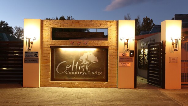 The entrance to Celtis Country Lodge with a sign indicating no hooting and a warning about video surveillance. - Celtis Country Lodge and Restaurant (Inxuba Yethemba)