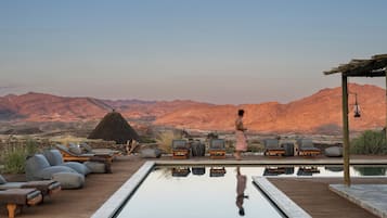 Outdoor pool, pool umbrellas, pool loungers