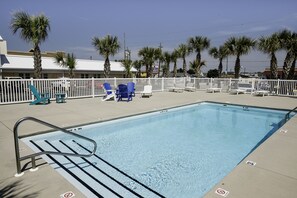 Outdoor pool, open 9:00 AM to 9:00 PM, pool loungers