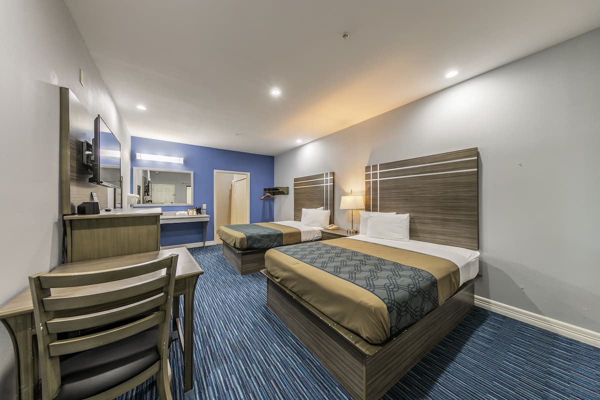 Pillow-top beds, desk, laptop workspace, iron/ironing board