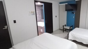 Habitación cuádruple Deluxe, varias camas