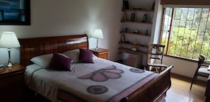 HABITACION JUNIOR SUITE COLINIAL | Ropa de cama de alta calidad, camas con pillow-top y cortinas blackout