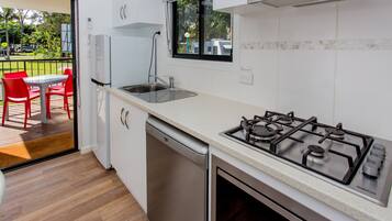 Parkview Two-Bedroom Cabin | Private kitchen | Fridge