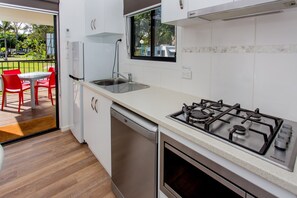Parkview Two-Bedroom Cabin | Private kitchen | Fridge