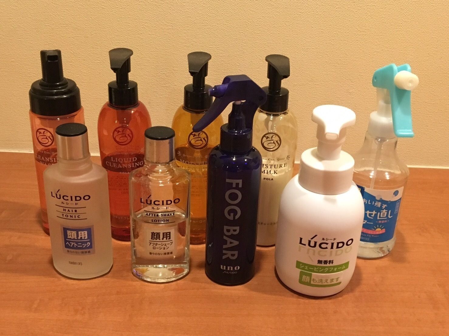 A variety of personal care products including hair tonic, after shave lotion, and a fog bar.