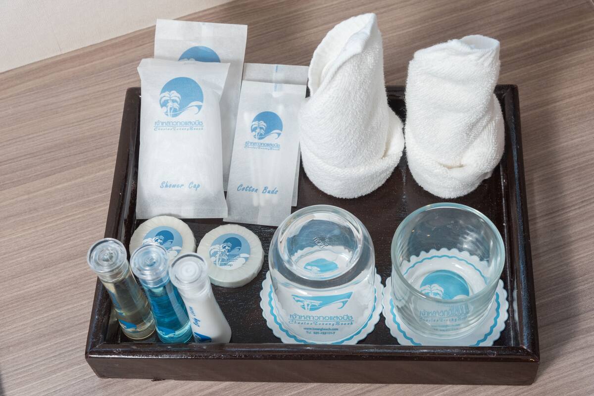 deluxe room | bathroom | shower, rainfall showerhead, free toiletries, hair dryer