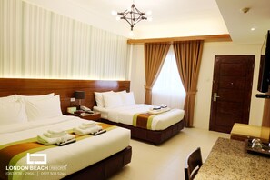 Deluxe Room, 2 Queen Beds, Non Smoking, Garden View | Hypo-allergenic bedding, minibar, in-room safe, desk - London Beach Resort and Hotel (General Santos)